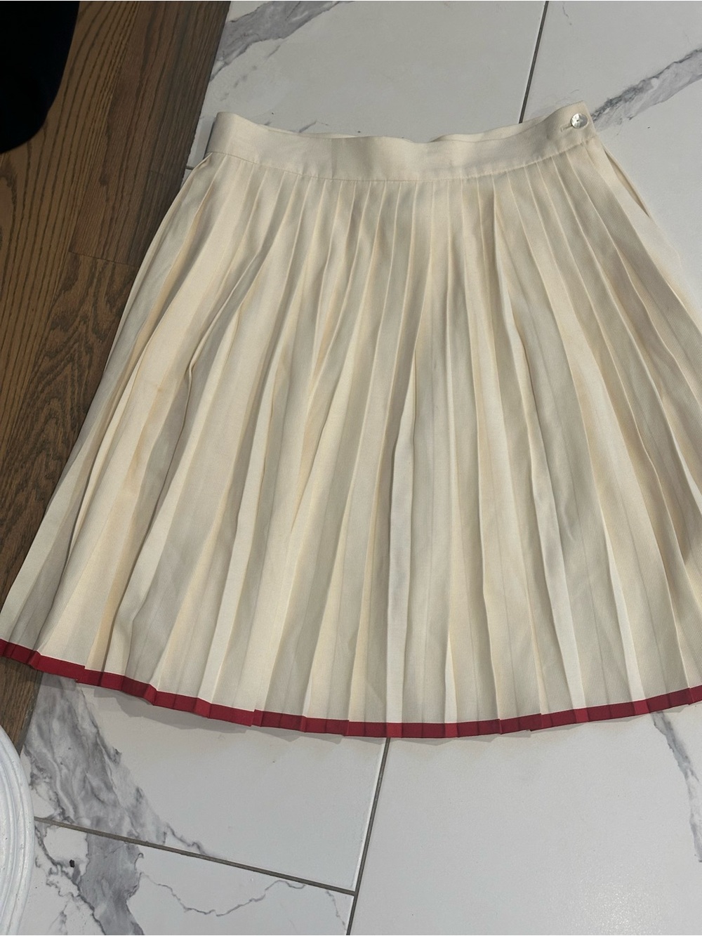 Mondi Cream Pleated Skater Skirt with Red Hem Trim